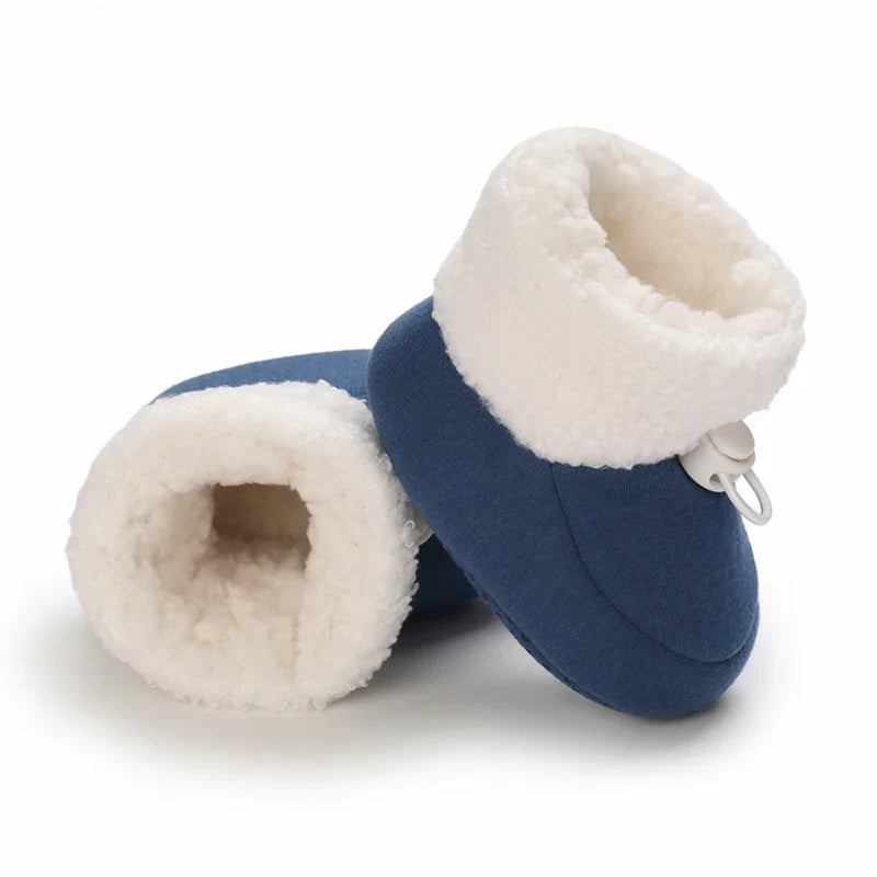 Bottes de bébé conçues pour garder les petits pieds au chaud