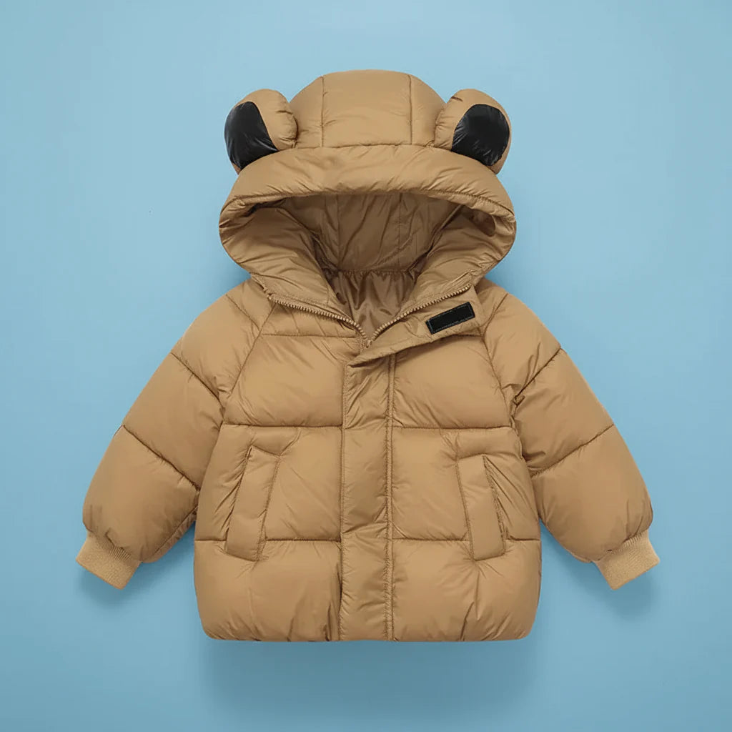 Vue rapprochée du tissu douillet du manteau pour enfant
