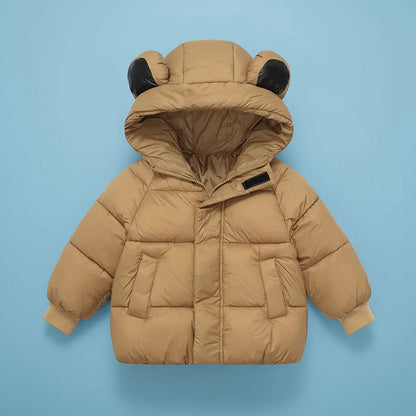 Vue rapprochée du tissu douillet du manteau pour enfant
