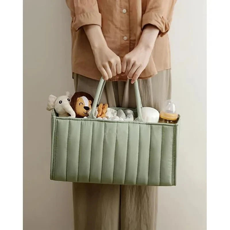 Panier à couches avec poignées longues pour un transport facile