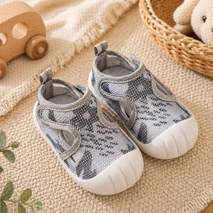 Chaussons chaussettes souples présentés en paire pour bébé et tout-petit