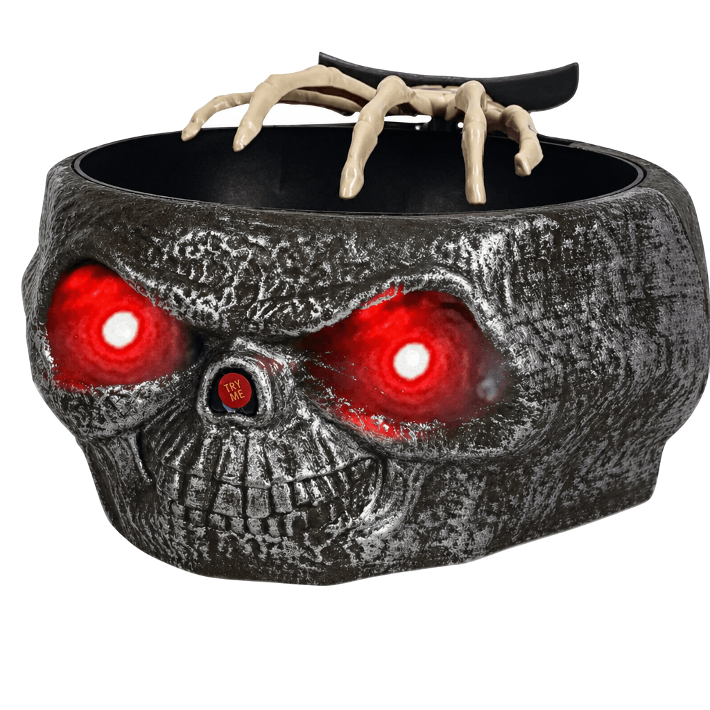 Détail des yeux lumineux du bol à bonbons d’Halloween