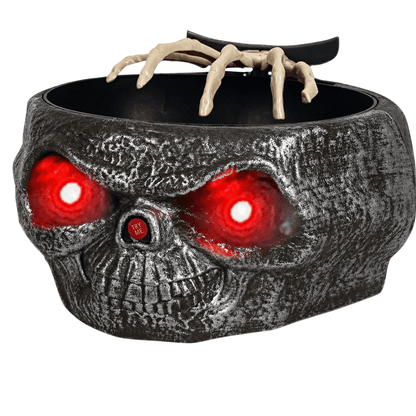 Détail des yeux lumineux du bol à bonbons d’Halloween