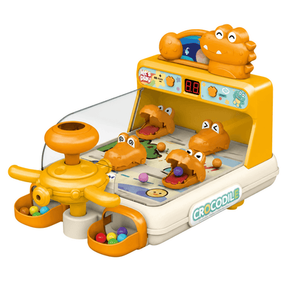Enfant s’amusant avec le jeu de flipper à billes