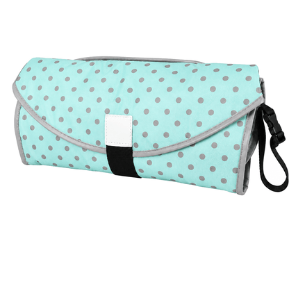 Matelas à langer compact conçu pour les sorties avec bébé