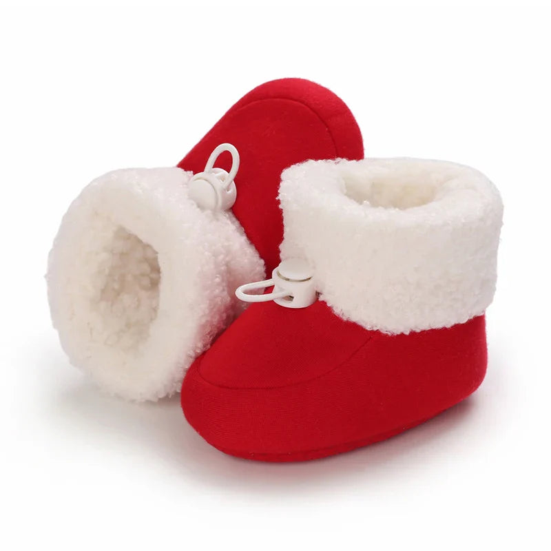 Vue de profil des bottes d’hiver pour bébé